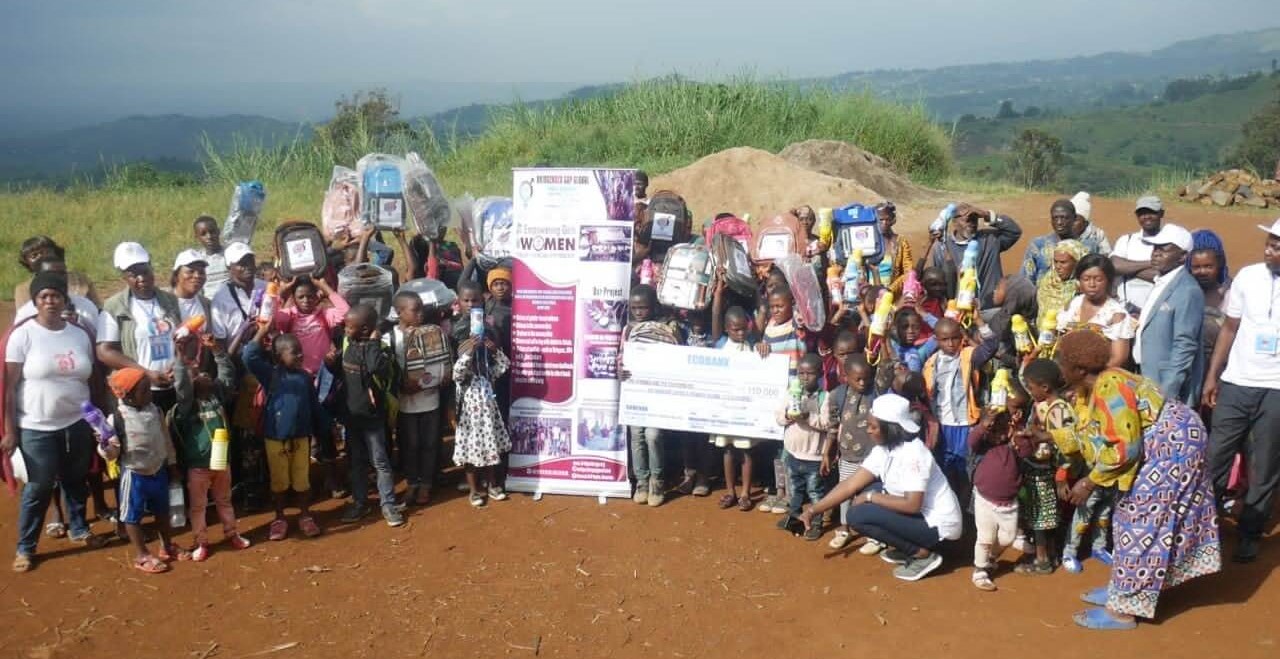 A cross section of double and paternal orphan children, pregnant teenage girls and teenage mothers with widows and BGG staffs at third day of project implementation in Aletening Village